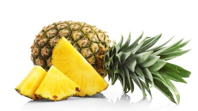 Sliced pineapple, isolated on white