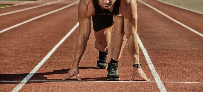 Runner on the track at a sport stadium