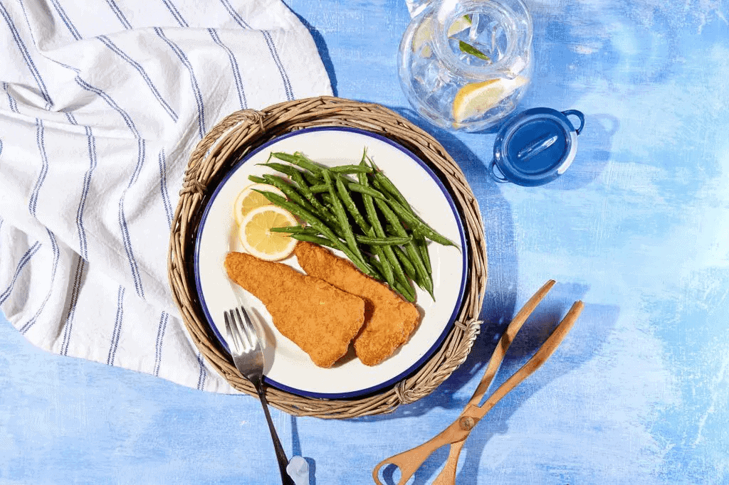 Heura Foods Gericht auf blauer Tischdecke V-Label Awards 2023