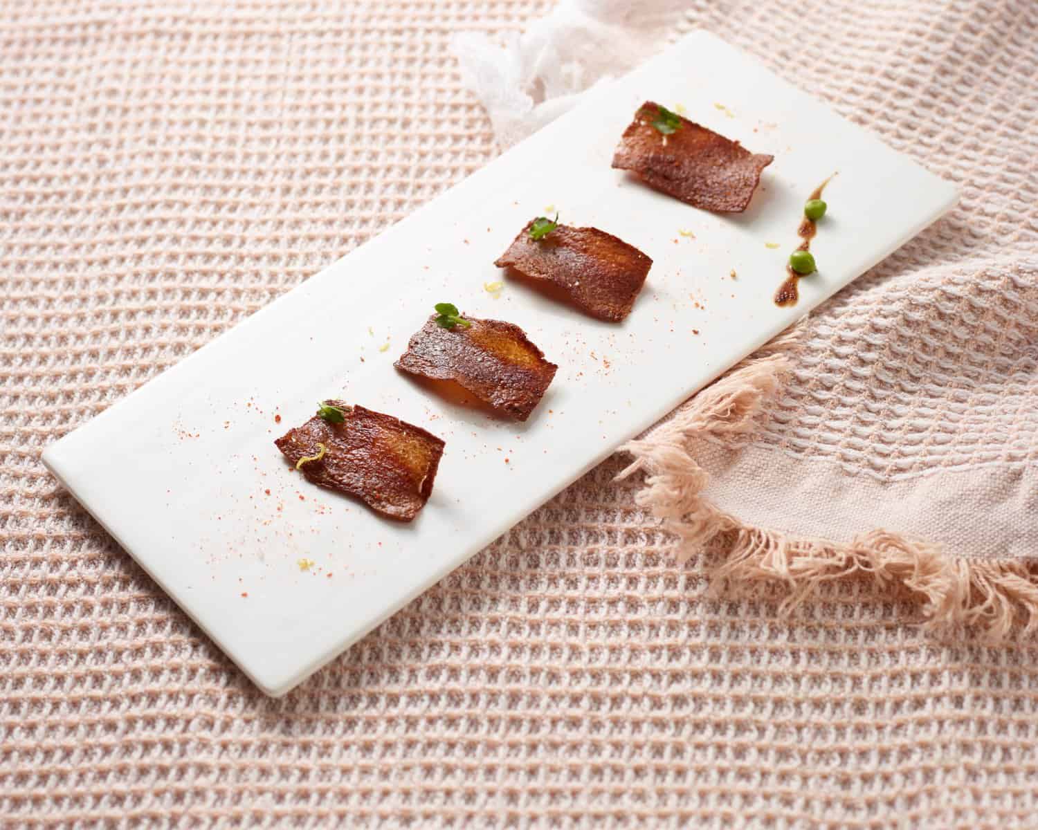 Mycelium bacon on a plate - CellX unveils its mycelium fermentation programme