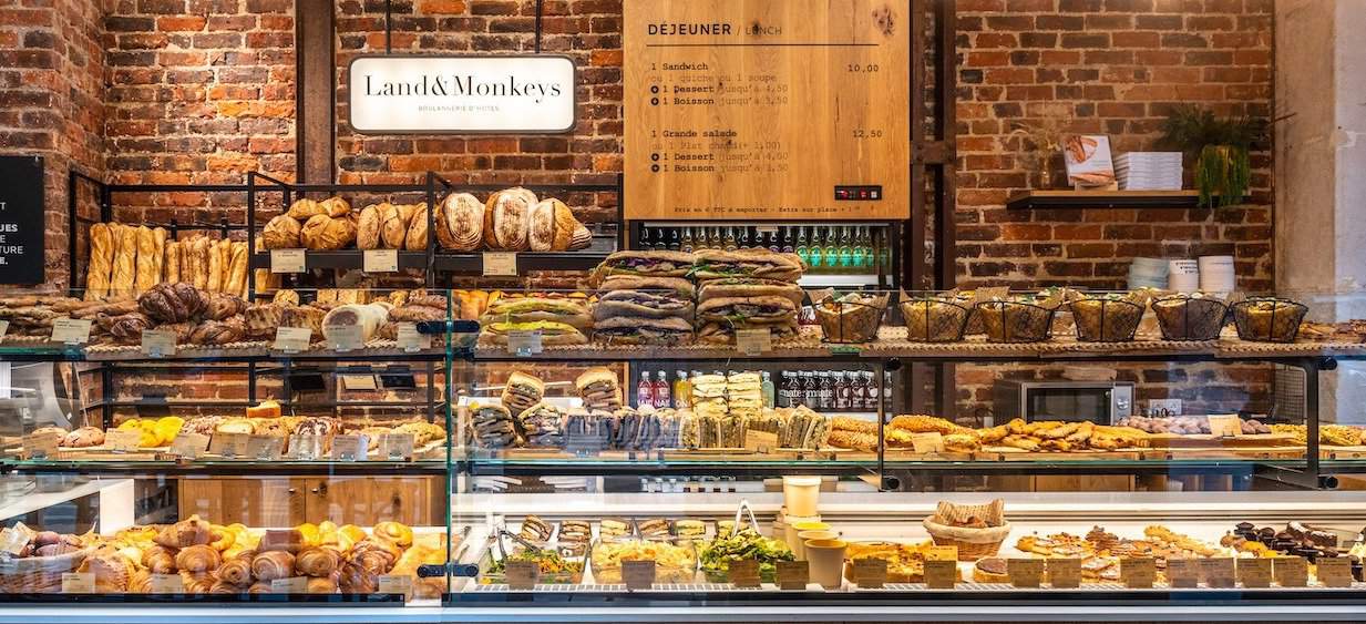 The counter of plant-based bakery Land&Monkeys displaying all sorts of bakery items.