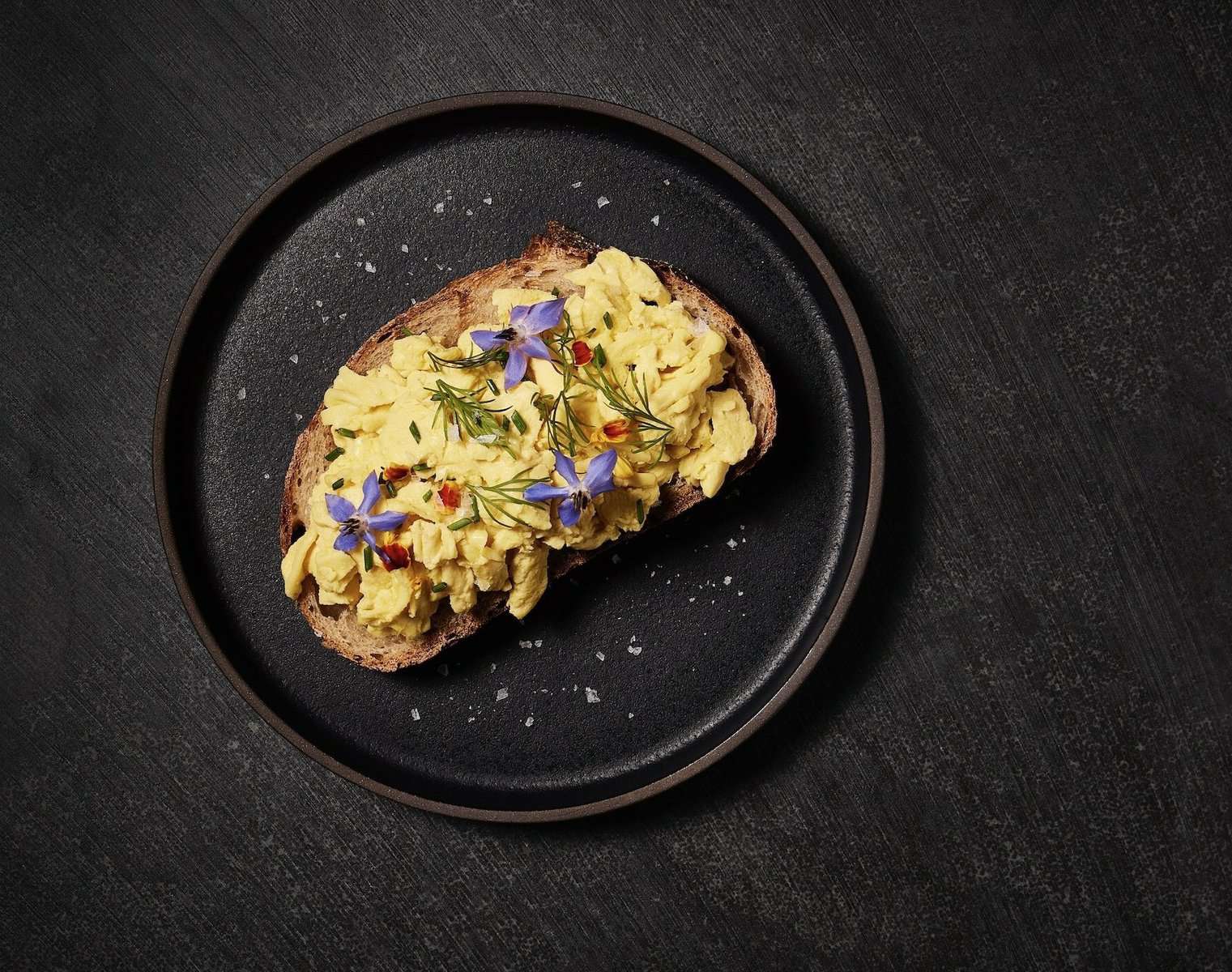 Animal-free scrambled eggs on a toast