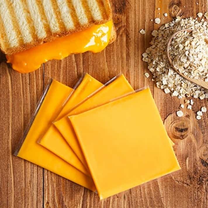 Armored Fresh Cheese Slices Made from Oat Milk