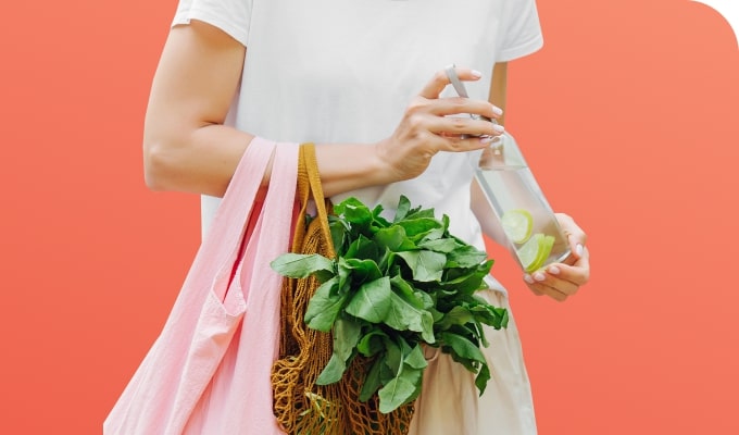 Woman with healthy food shopping spinach Tastewise
