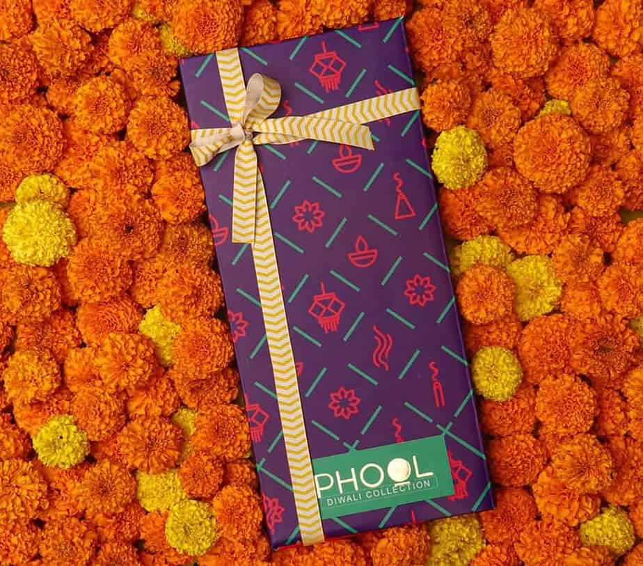 phool's gift product on top of a bed of temple flowers