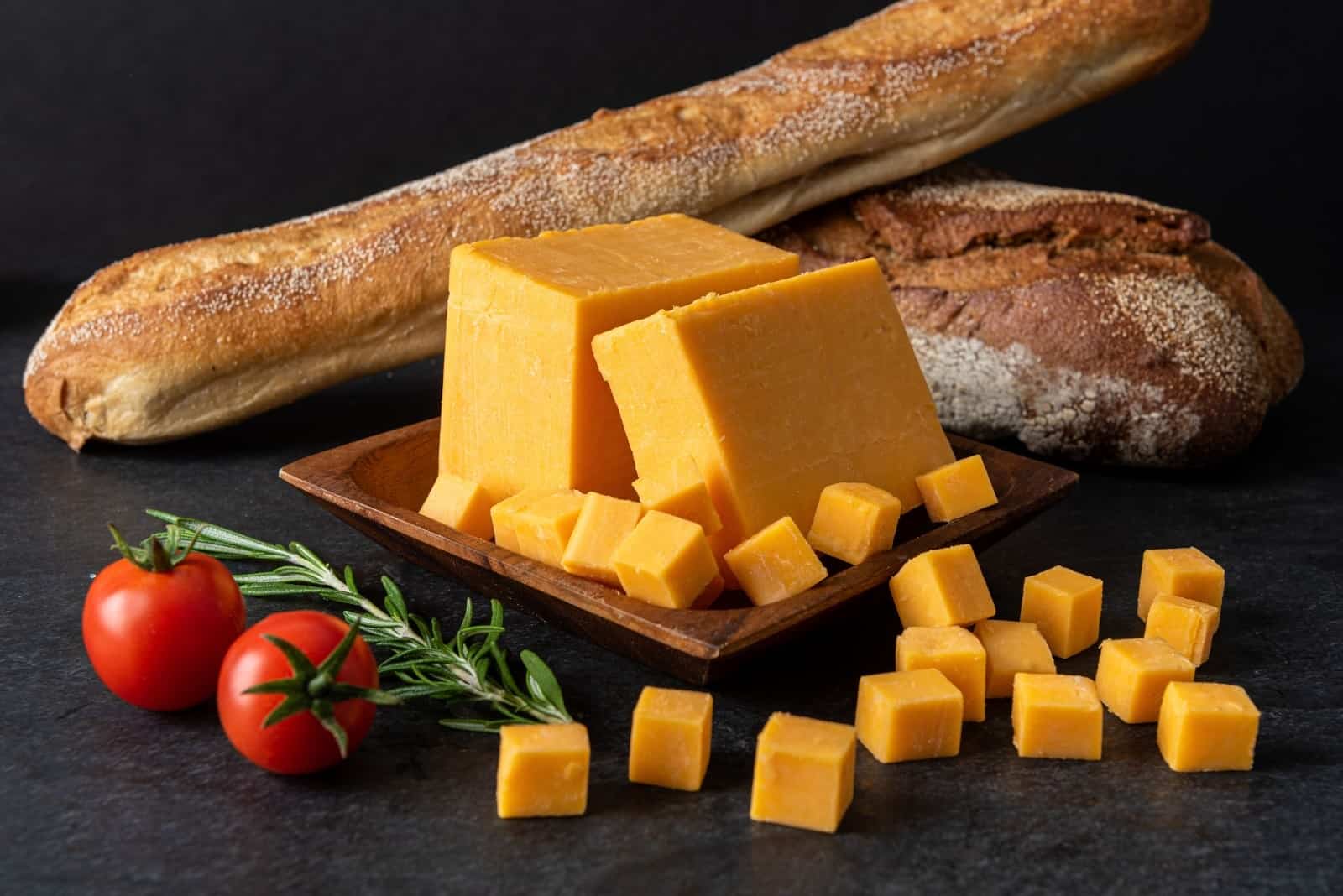 vgarden plant-based cheese cut on a wooden board