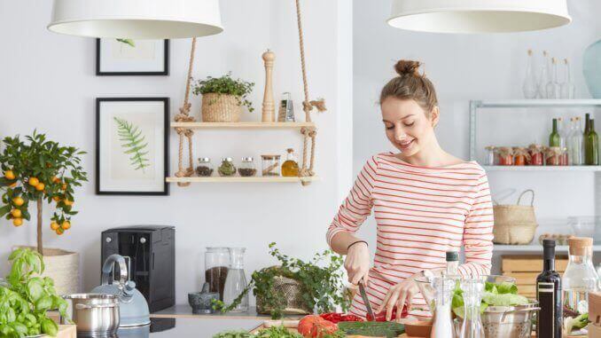 Woman cutting vegetables
