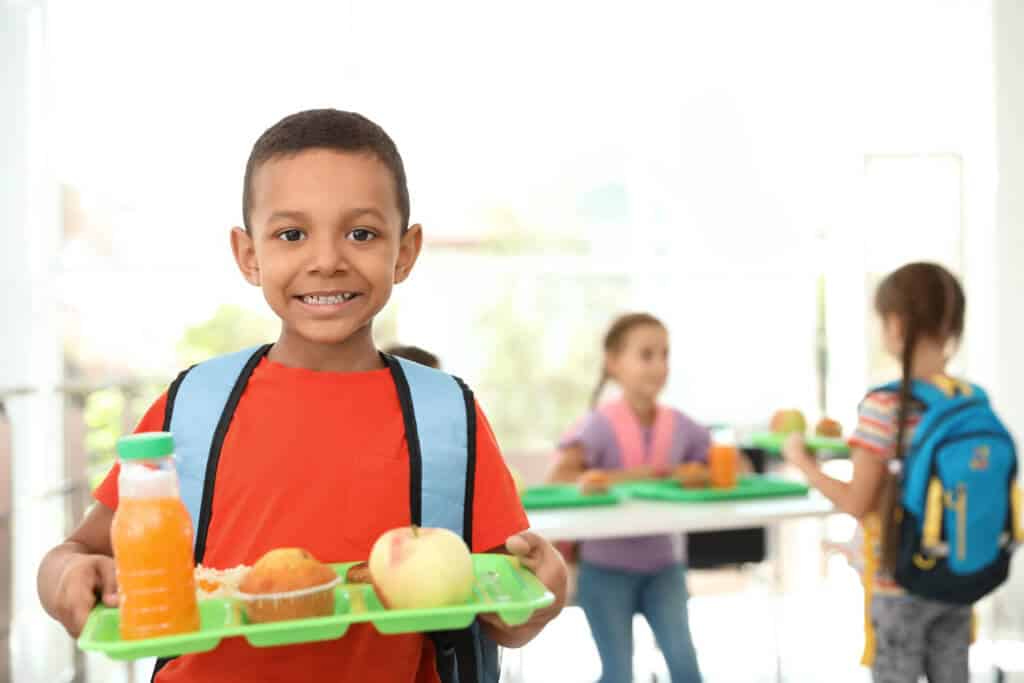 child of color, school cafeteria, food security, social justice, impossible foods, Colin Kaepernick, Know Your Rights Camp